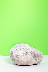 Image showing Single waterworn smooth white rock