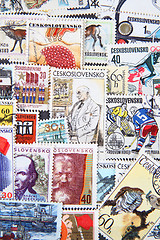 Image showing used postage stamps collection background