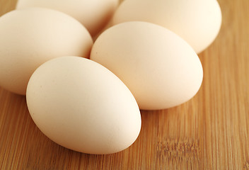 Image showing Fresh egg on wood table