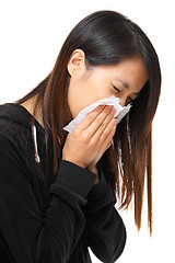 Image showing cold sneezing asian woman