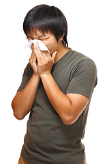 Image showing man blowing nose 