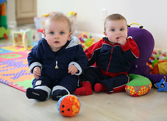 Image showing Baby brothers playing