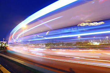 Image showing traffic through city at night