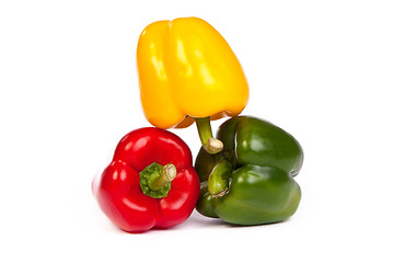 Image showing Group of seet bell peppers isolated on white