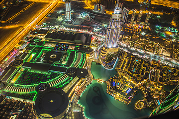 Image showing Dubai downtown night scene with city lights,