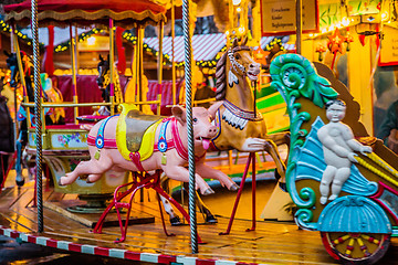 Image showing Carousel. Horses on a carnival Merry Go Round.