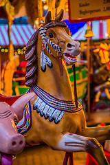 Image showing Carousel. Horses on a carnival Merry Go Round.