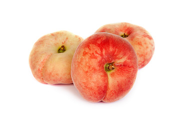 Image showing Three ripe fig peach on white