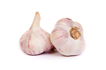 Image showing Group of garlics . A heads of garlics isolated