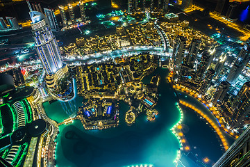 Image showing Dubai downtown night scene with city lights,