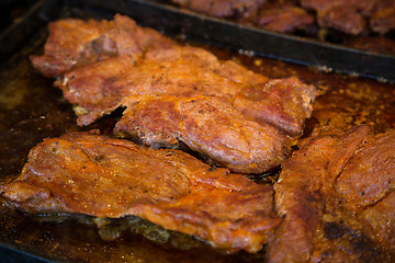 Image showing Steak and other meat on barbeque. Background