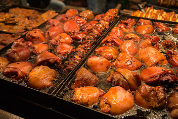 Image showing Steak and other meat on barbeque. Background