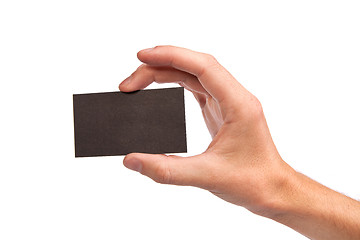 Image showing Businessman's hand holding blank business card