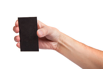 Image showing Businessman's hand holding blank business card