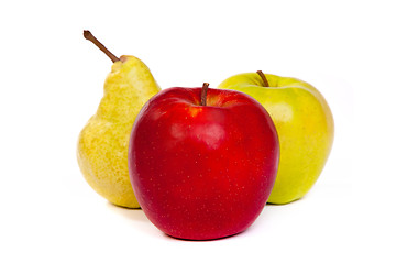 Image showing A pear and a red apple and a green apple isolated on white