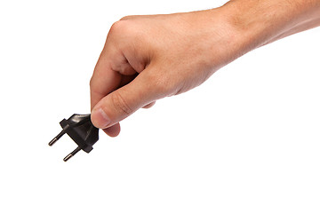 Image showing Man is holding a black outlet in the hand