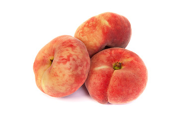 Image showing Three ripe fig peach on white