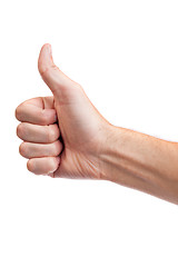 Image showing Male hand showing thumbs up sign isolated on white