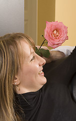 Image showing man offering flower to a woman