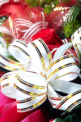 Image showing Holiday ribbon on the flower