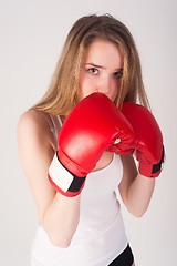 Image showing Pretty girl with boxing gloves