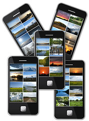 Image showing five modern mobile phones with many photo of landscapes