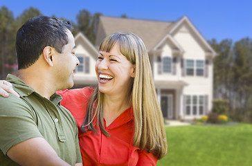 Image showing Happy Mixed Race Couple in Front of House