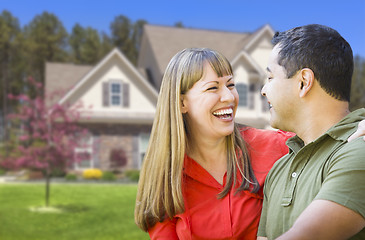 Image showing Happy Mixed Race Couple in Front of House