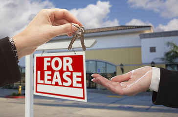 Image showing Handing Over Keys in Front of Business Office and Sign