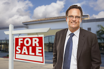 Image showing Businessman In Front of Office Building and For Sale Sign