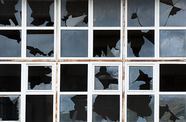 Image showing Broken windows of old building