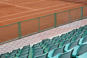 Image showing Grandstand seats and tennis court