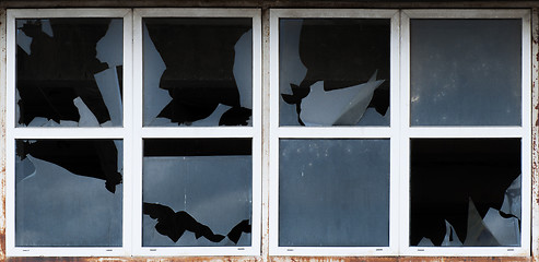 Image showing Broken windows of old building