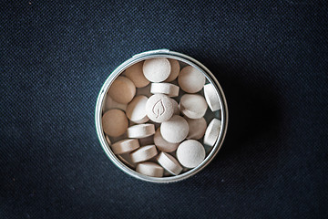 Image showing Natural vitamin pills in package on dark background 