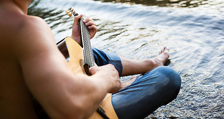 Image showing Man and guitar