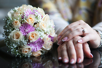 Image showing Hand with flowers