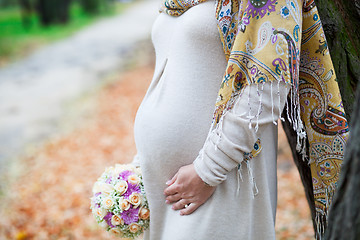 Image showing pregnant woman with flowers