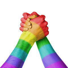 Image showing Man and woman in arm wrestlin, rainbow flag pattern