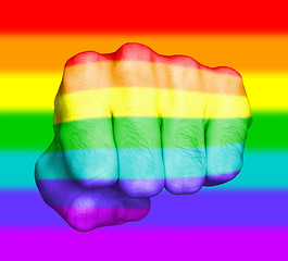 Image showing Fist of a man punching, rainbow flag pattern