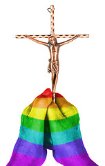 Image showing Old woman with catholic crucifix, isolated, rainbow flag pattern