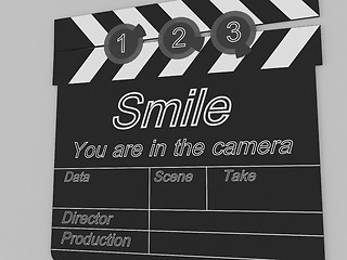 Image showing Movie production clapper board notifying to the people that smil