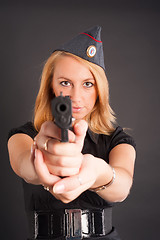 Image showing Pretty woman with a gun