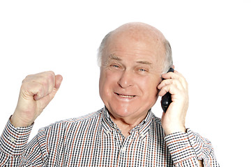 Image showing Happy senior man on his mobile phone