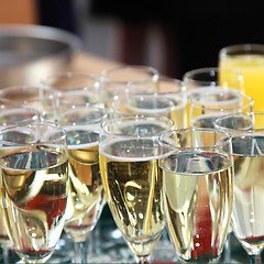 Image showing Elegant flutes filled with champagne