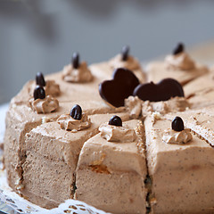 Image showing Chocolate birthday cake with heart shapes