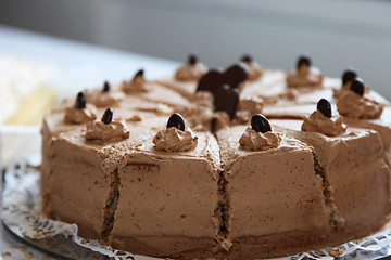 Image showing Creamy tasty chocolate birthday cake, close-up