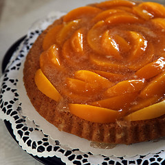 Image showing Colourful peach flan or tart