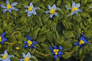 Image showing Blue embroidered flowers