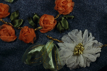 Image showing White chrysanthemum and orange roses