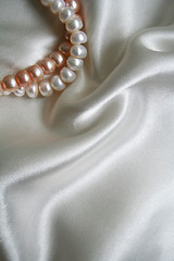 Image showing Smooth elegant white silk with pearls as background